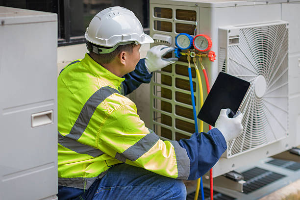 Professional Air Conditioning Repair technician working in Wakefield, RI